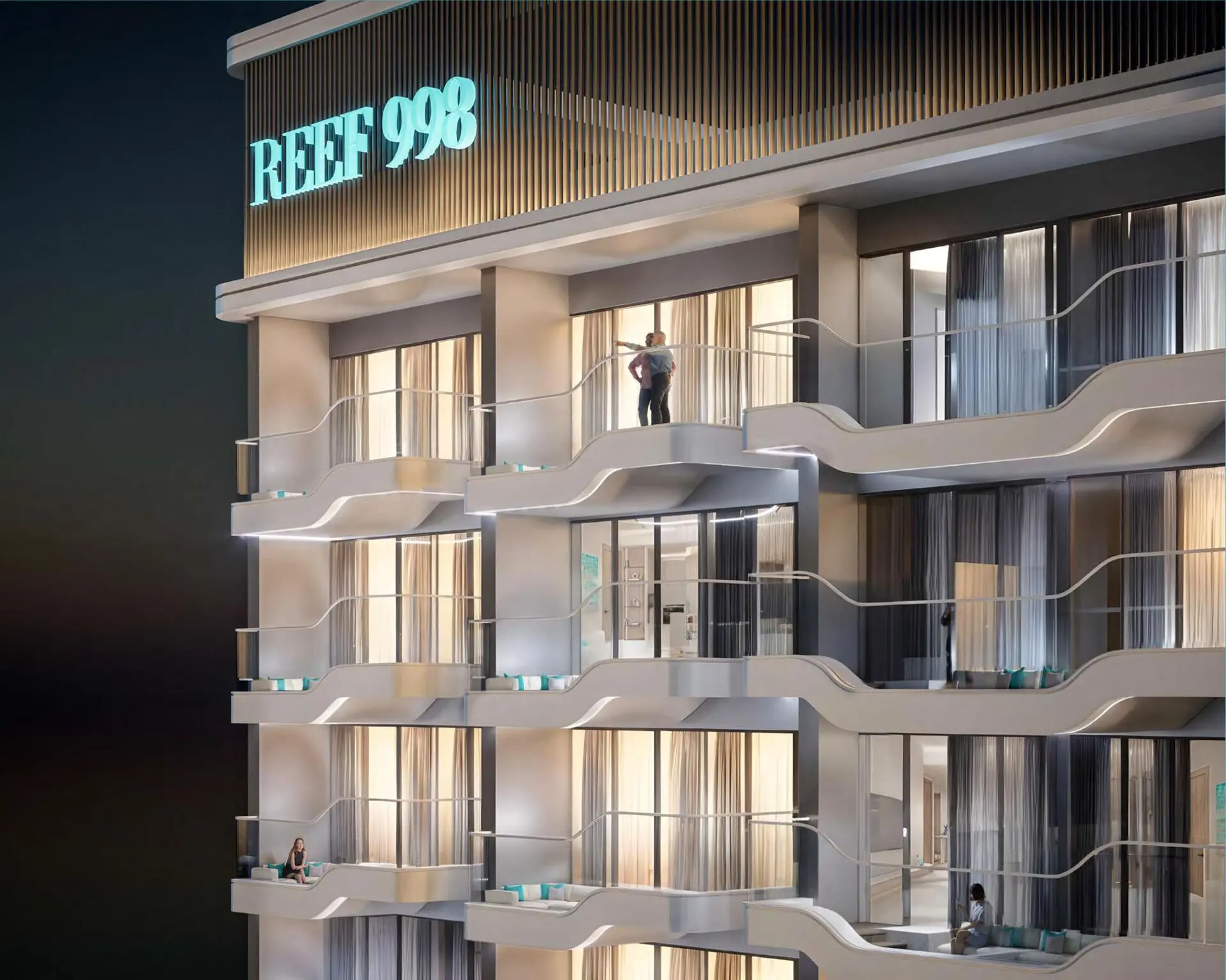 Modern Reef 998 building facade with illuminated balconies and residents enjoying the night views.