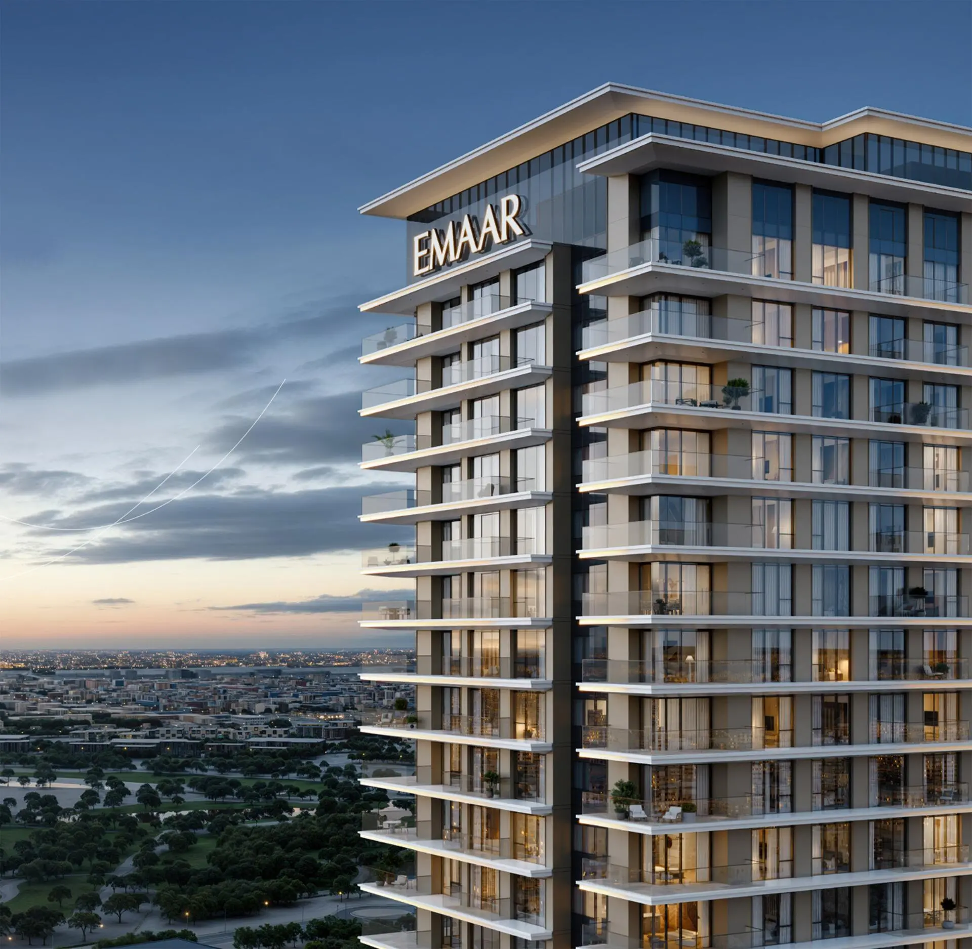 The sleek exterior of Silva Tower, featuring Emaar branding and a city skyline at dusk.