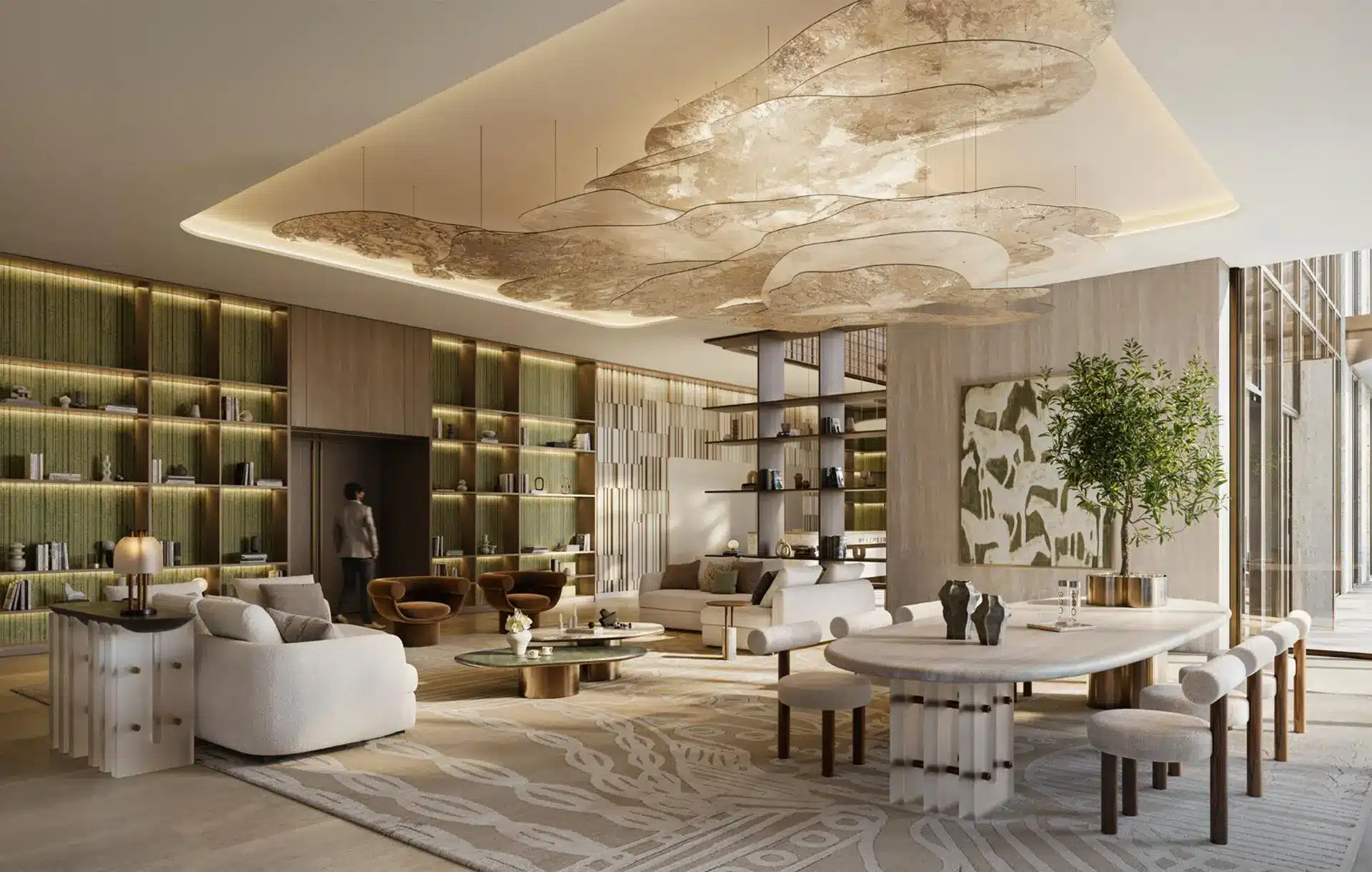 A stylish interior of Silva Tower with modern furniture, bookshelves, and a tree centerpiece.