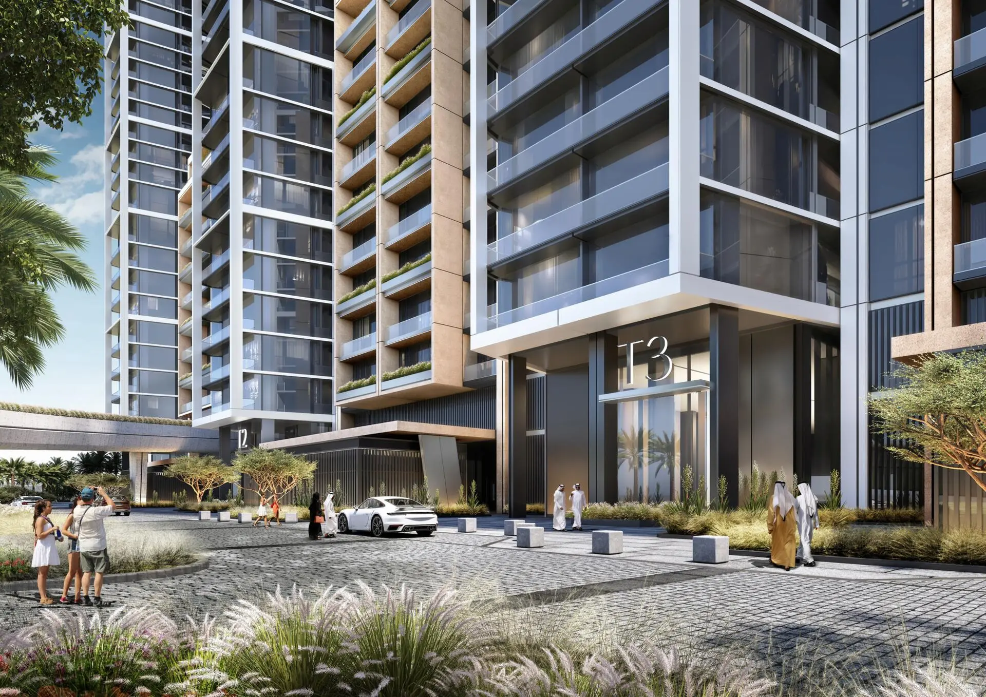 Modern high-rise towers at Sobha Central with glass façades, luxury car, and landscaped entry.