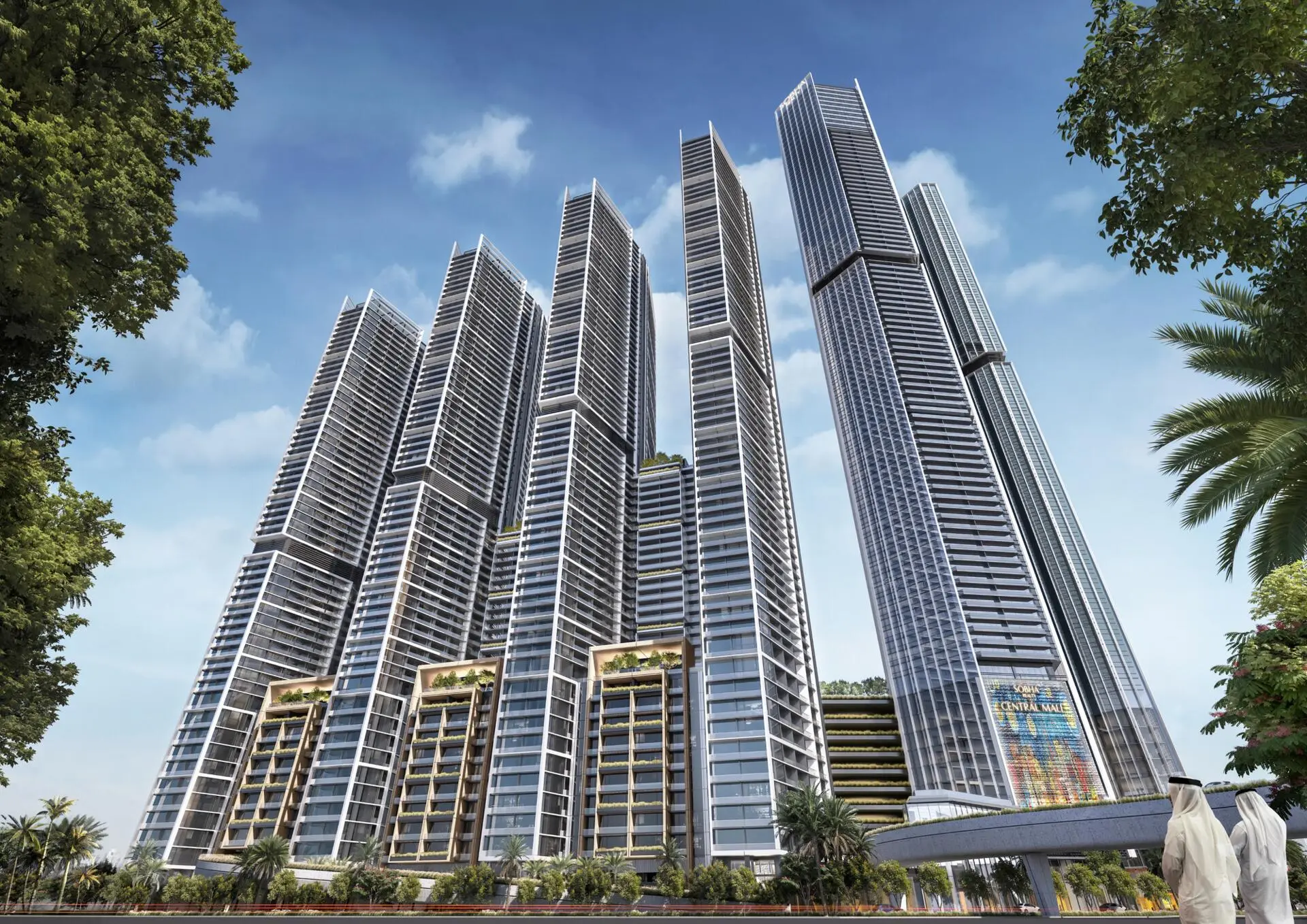 Modern skyline view of Sobha Central’s sleek high-rise towers with lush greenery and highways.