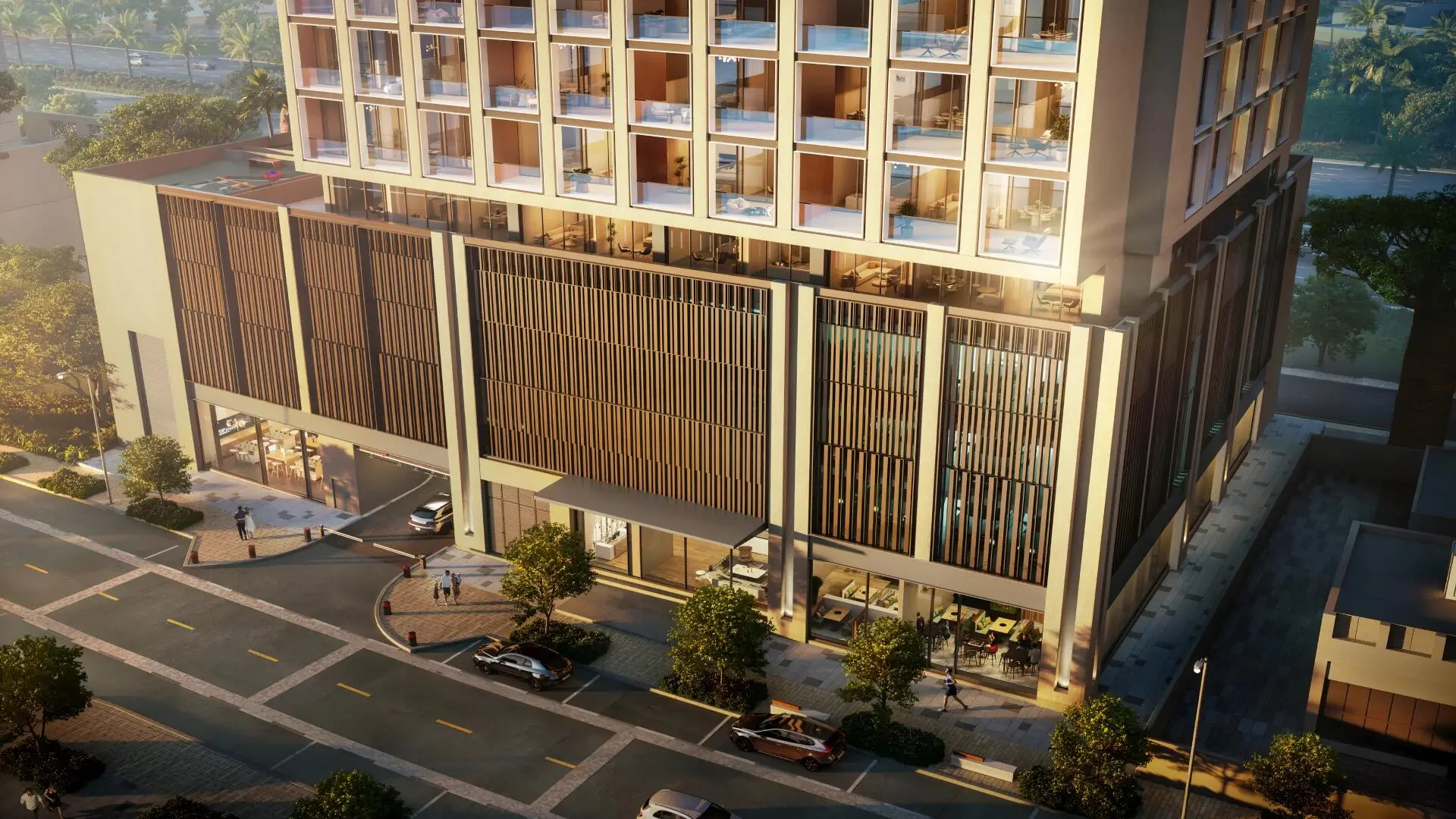 Modern street view of Binghatti Moonlight showing its stylish facade, glass balconies, and retail fronts.