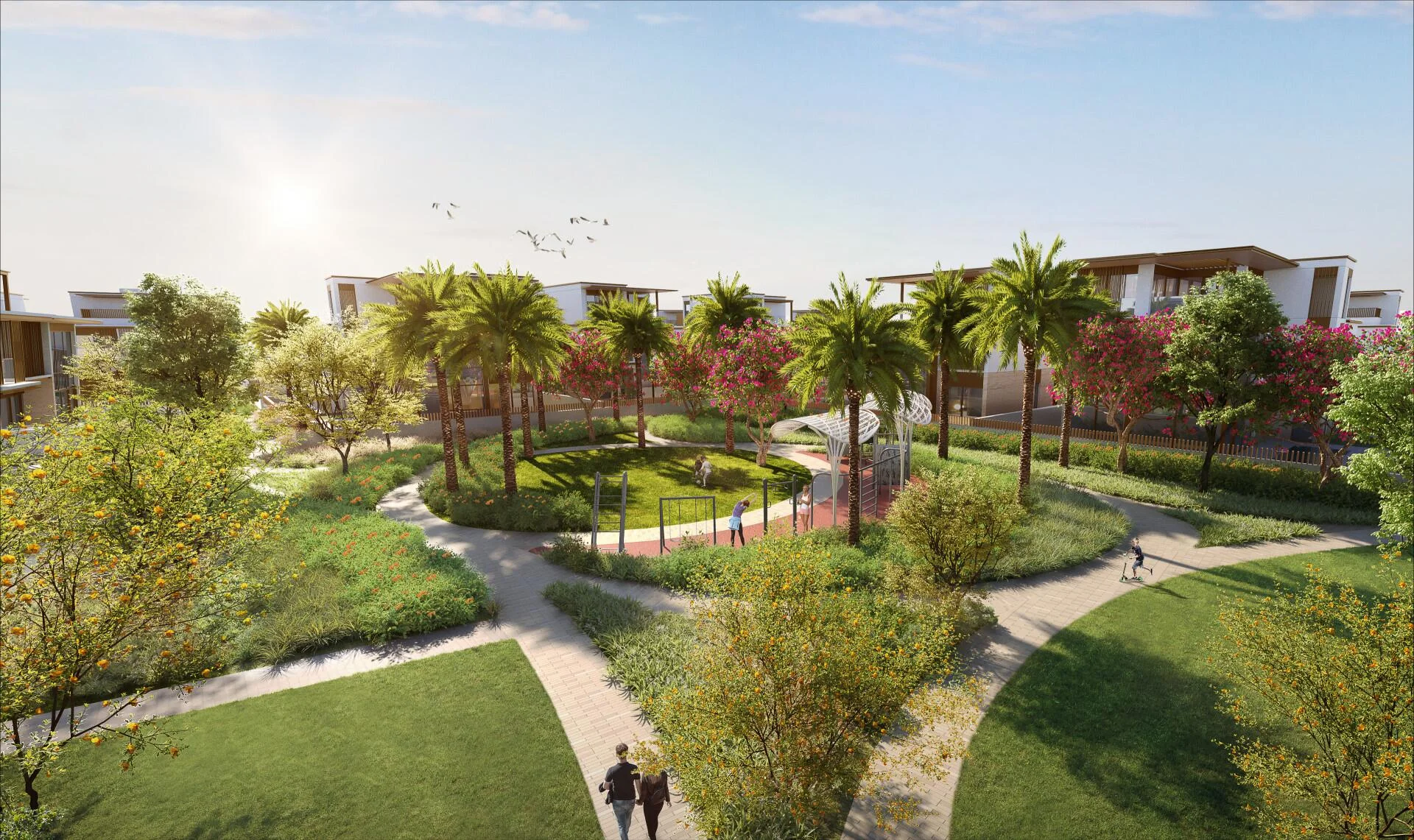 Lush park with palm trees, walking paths, and play areas in Nad Al Sheba Gardens community.