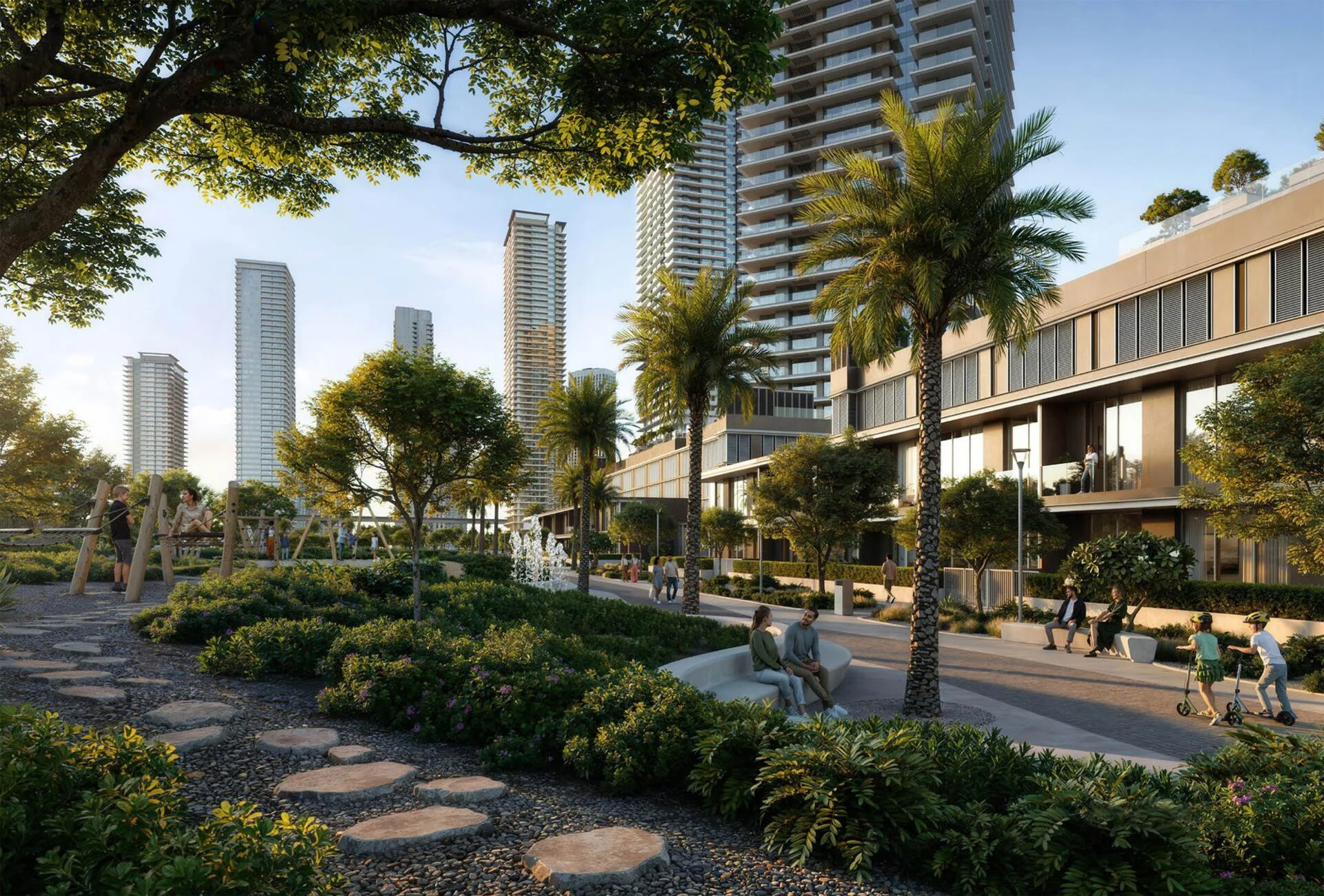 Lush landscaped walkway at Montiva by Vida with modern towers and outdoor leisure spaces.